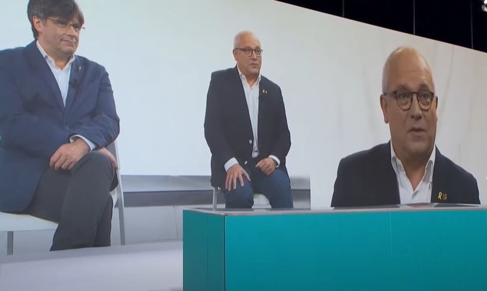 El exconseller Lluís Puig, elegido presidente de la Mesa del congreso del nuevo JxCat, interviene en el acto de presentación del partido.