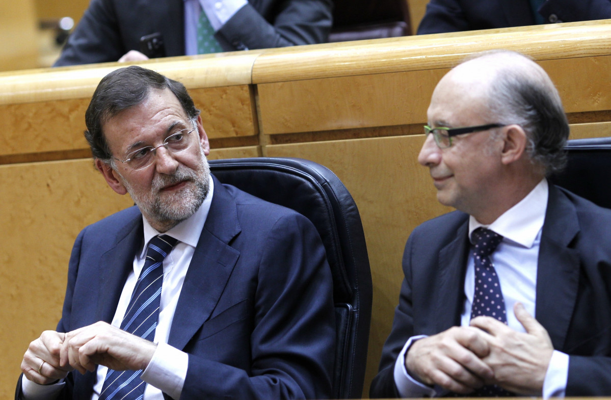 Rajoy y Montoro juntos en el Pleno del Senado