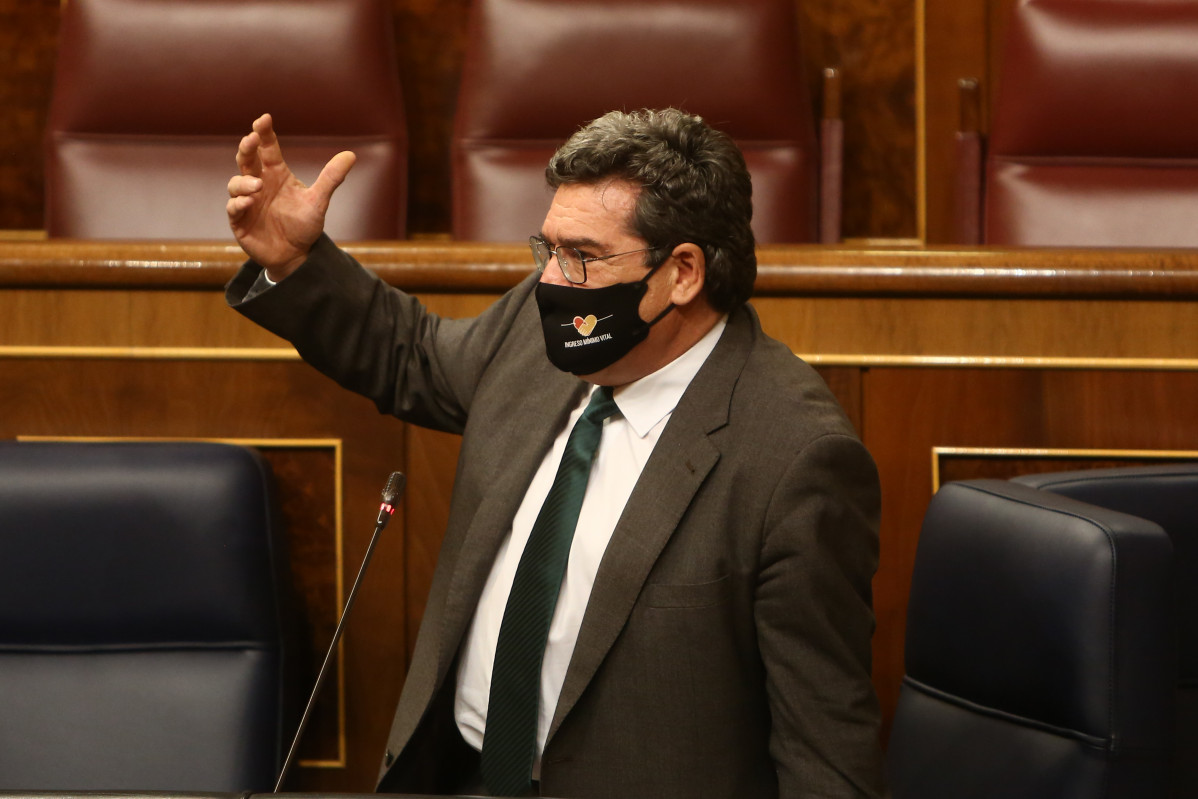 El ministro de Seguridad Social, Inclusión y Migraciones, José Luis Escrivá, interviene durante una sesión de control al Gobierno, en Madrid (España), a 16 de diciembre de 2020. Esta sesión de c
