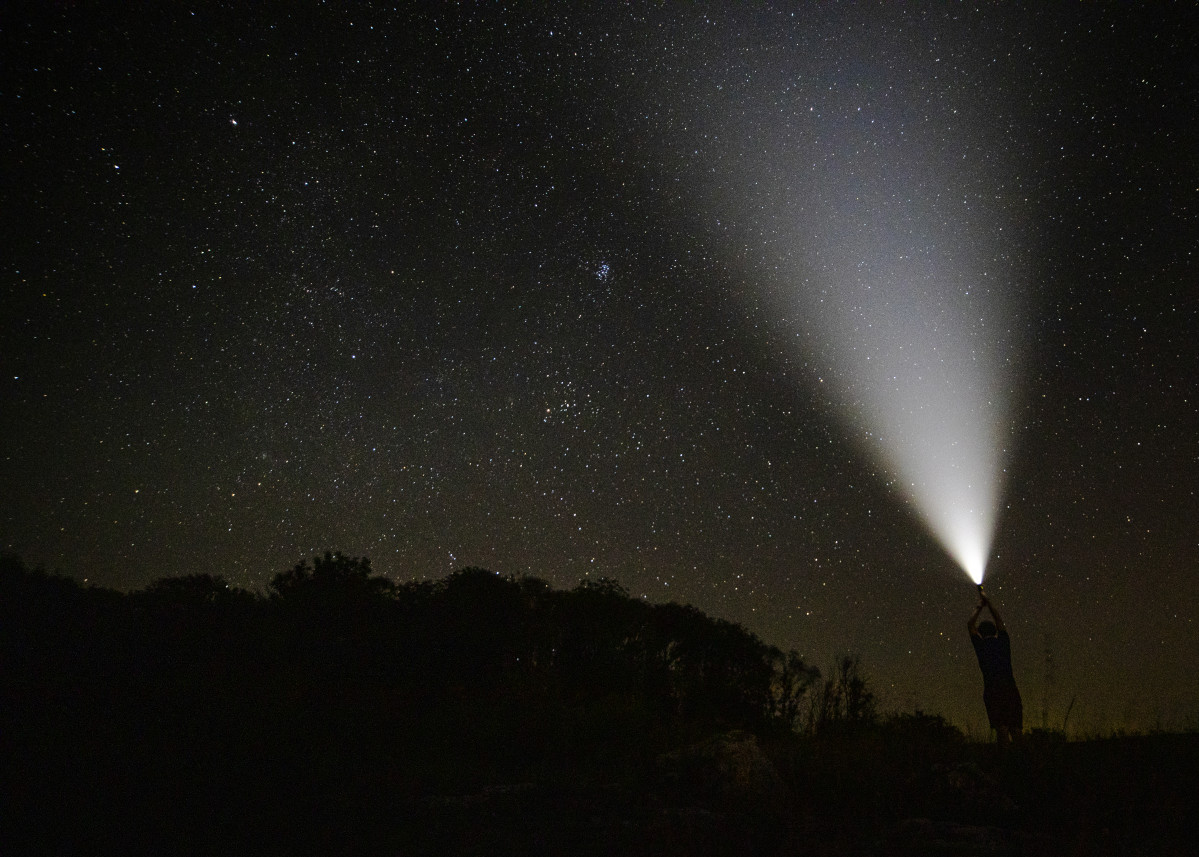 Beam light starry night sky