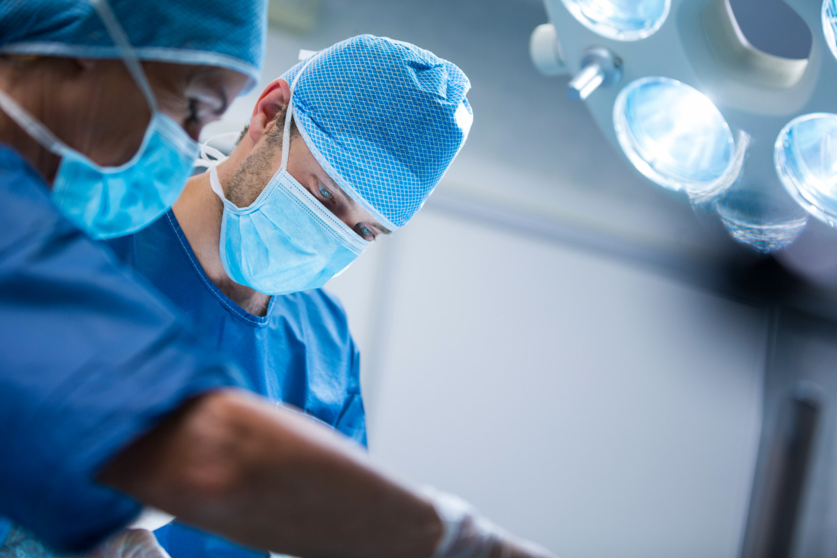 Surgeons performing operation operation room