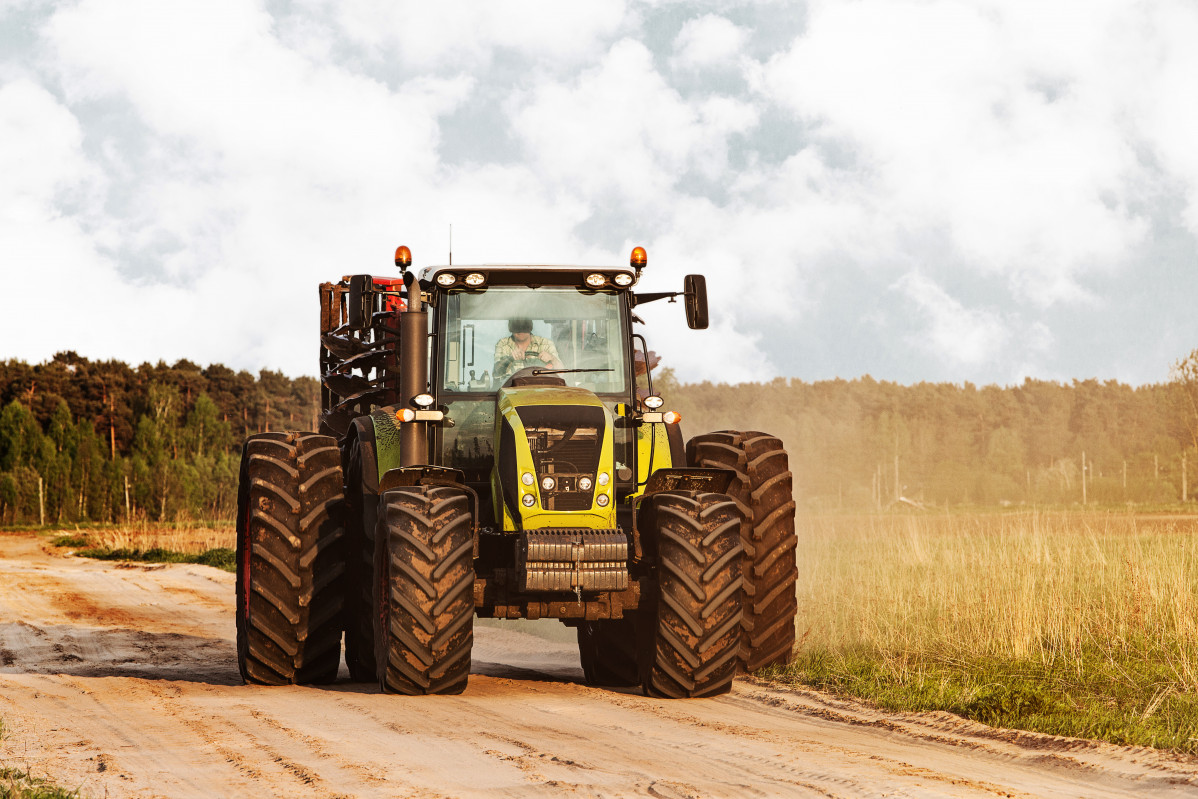 Tractor road countryside near meadows