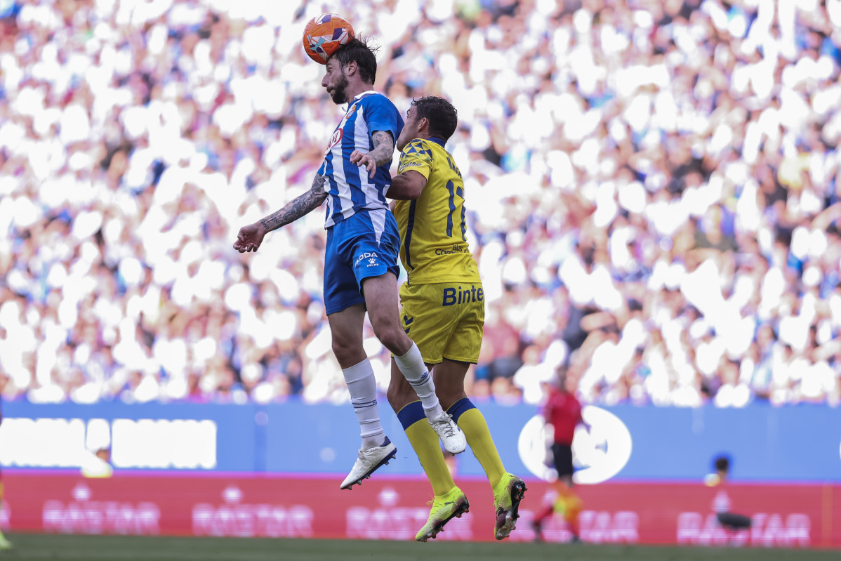 EuropaPress 6746223 fernando calero of rcd espanyol and jaime mata of ud palmas compete for the
