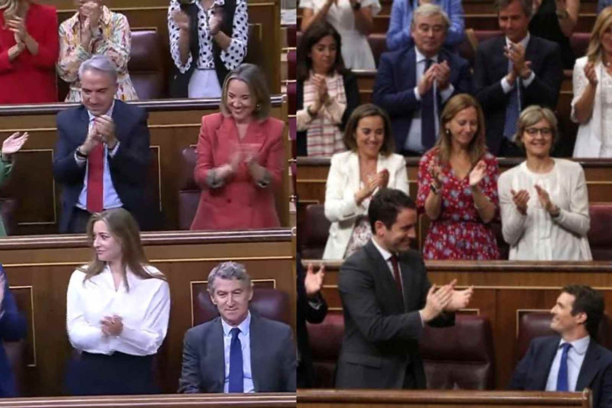 Alberto Núñez Feijóo y Pablo Casado siendo ovacionados por los miembros del PP (1)