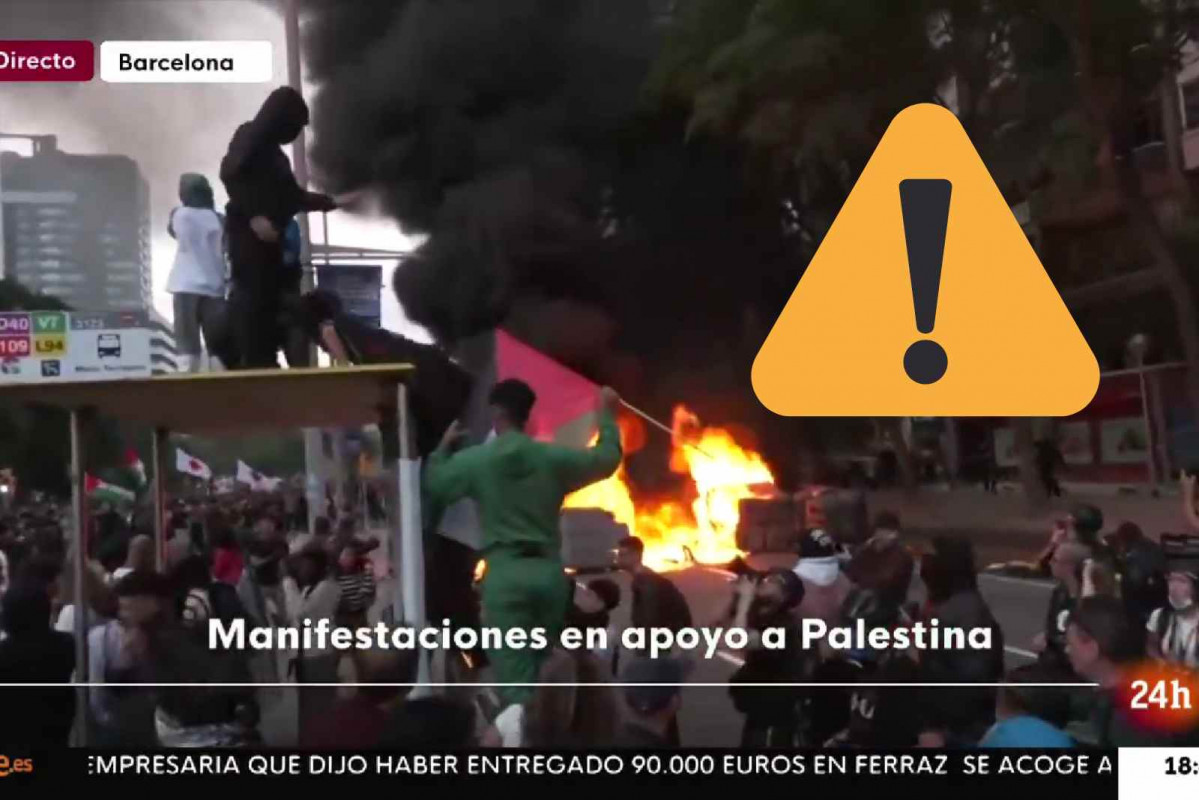 Contenedores incendiados en la calle Tarragona de Barcelona (1)