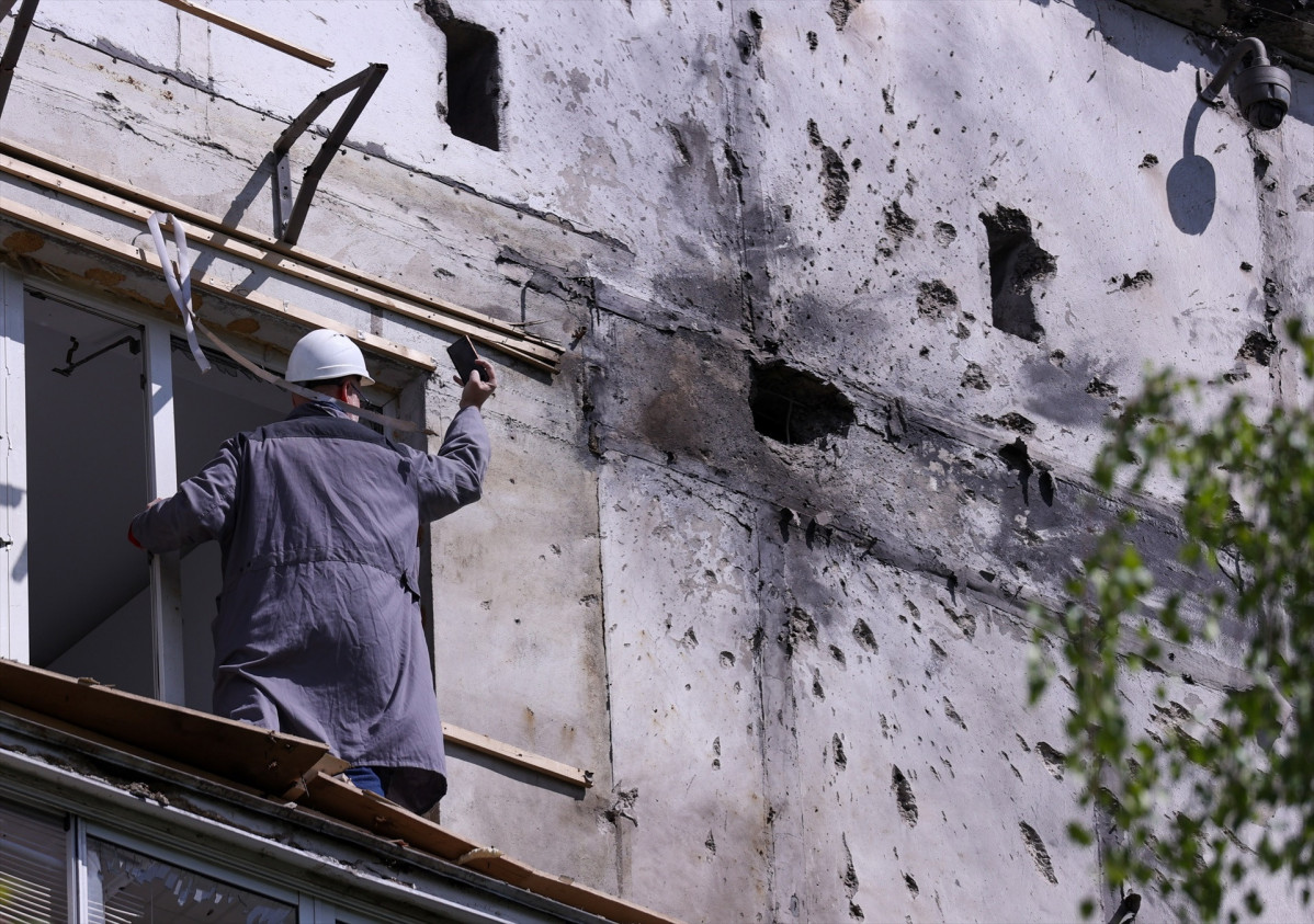 EuropaPress 6702527 06 may 2025 russia moscow man takes photographs of damage to an apartment