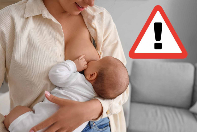 Una policía amamanta a un bebé que fue tirado a una alcantarilla por sus padres