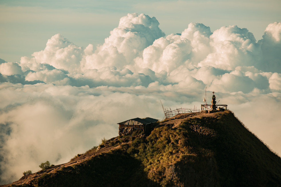 Landscape temple clouds top batur volcano bali indonesia