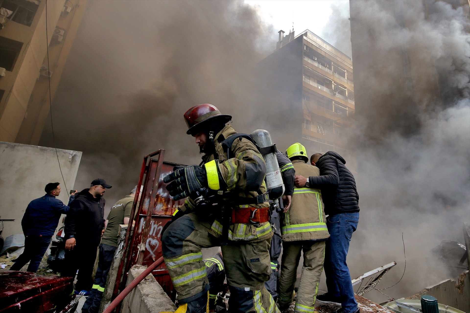 EuropaPress 7423490 08 april 2026 lebanon beirut firefighters hose down fire at the site hit by