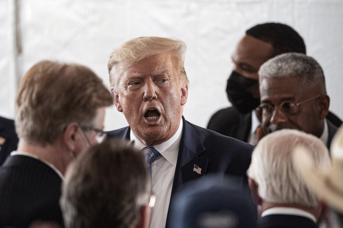 Donald Trump en un actora con invitados y donante en Midland
